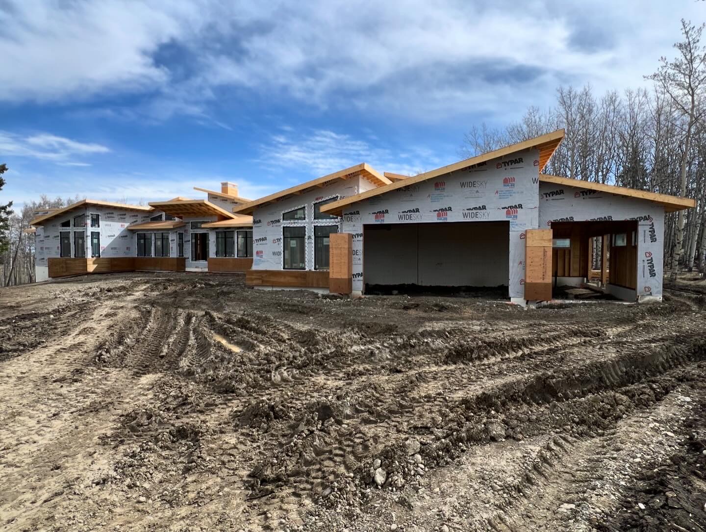 Wide elevation of a modern framed bungalow